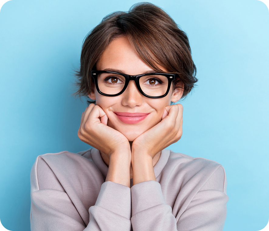 Woman smiling with glasses and short hair
