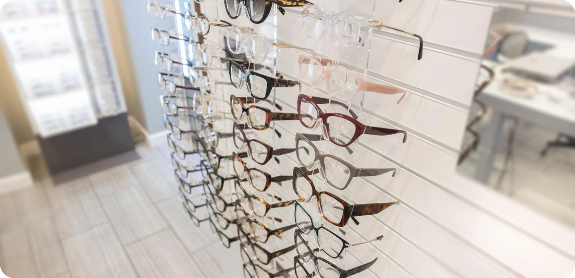 Eyeglasses displayed on a store wall